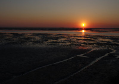 Sonnenuntergang über dem Wattenmeer